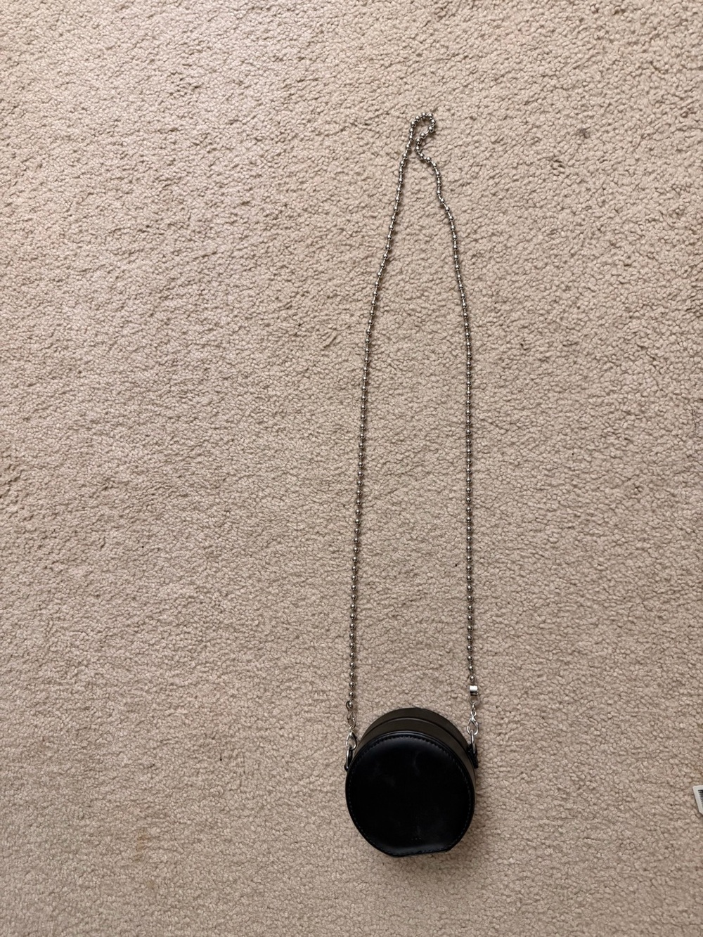 Round Black Crossbody Bag with Silver Chain Strap